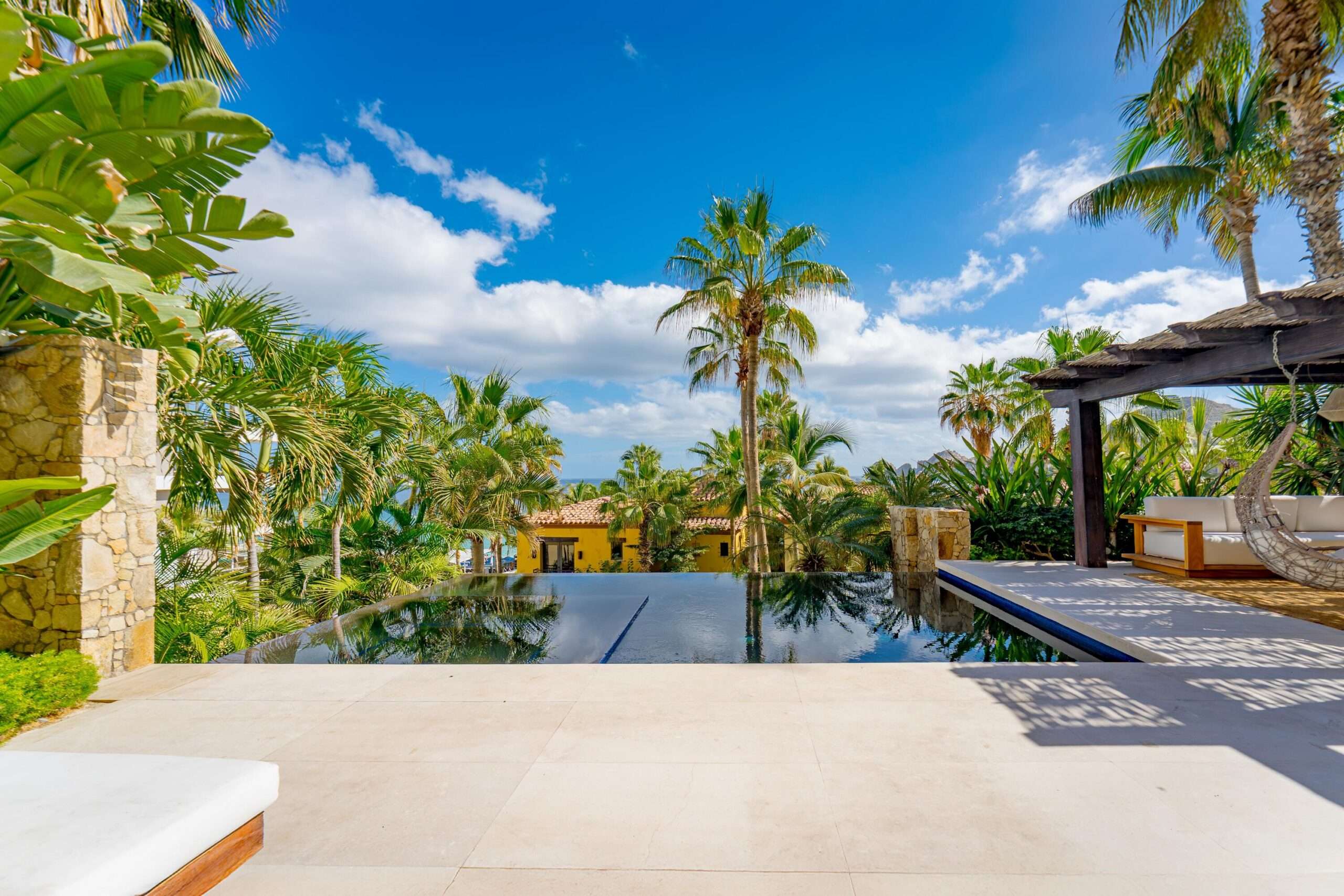 Hacienda CSL Hacienda Csl This fully renovated three-bedroom property offers a seamless indoor-outdoor layout designed for comfortable coastal living.The private terrace features a pool, hot tub, BBQ area, and a dedicated outdoor bar, complemented by a shaded lounge and seating area surrounded by mature landscaping, ideal for entertaining or everyday relaxation. The ground-level setting allows easy access to outdoor spaces while maintaining privacy. Inside, the residence has been completely updated with clean, modern finishes and a functional floor plan. Bedrooms are well sized and thoughtfully distributed for both owners and guests. The layout includes a family suite / additional sleeping space (bunk room or flex sleeping area), allowing accommodation for up to 8 guests, offering greater flexibility than the typical 3-bedroom layout designed for six.Set in one of the most desirable areas of Cabo San Lucas, the property enjoys direct beach access and close proximity to the marina, restaurants, and services, all within the Hacienda Beach Club community. for sale