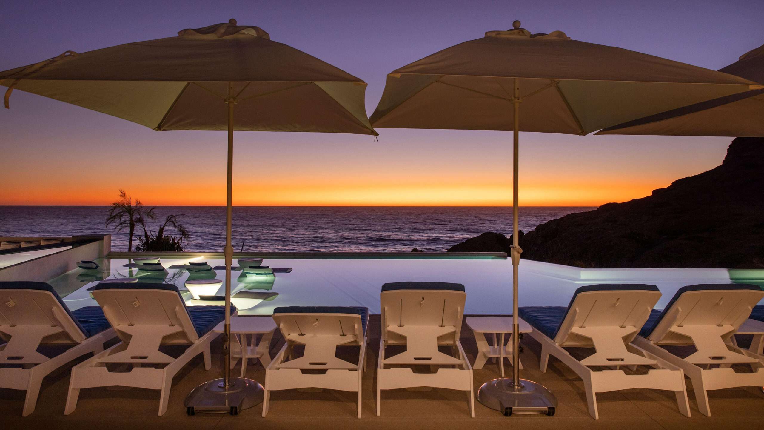 Hacienda CSL Hacienda Csl Just listed in Hacienda Beach Club Phase II at 1Homes Cabo A rare opportunity to own a beautifully designed 2-bedroom condo in one of Cabo's most exclusive beachfront communities. This residence is part of a 3-bedroom lock-off unit, but the developer is offering only the 2-bedroom side for sale. The legal separation is already in process, making this a unique chance to secure a luxury home at a more accessible price point.Enjoy panoramic ocean and marina for sale